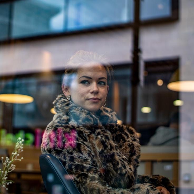 Jordan Reed, Client Relations Director, discussing corporate gifting strategy with business clients